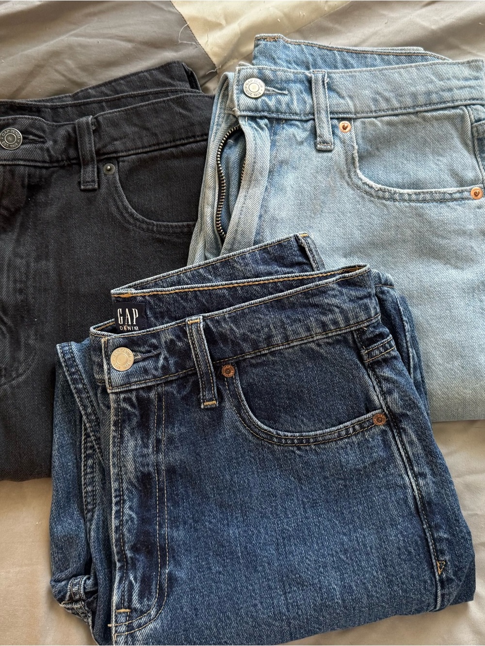 GAP Women’s Three-Pack Straight Jeans in Dark Blue, Light Blue, and Black